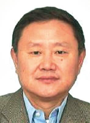 外逃犯胡玉兴被指打澳记者 拥价值65万澳元住宅